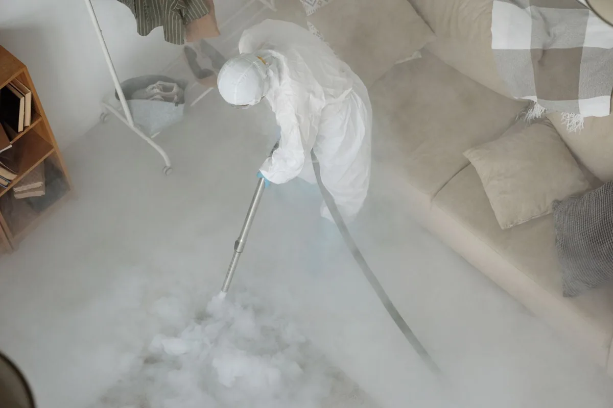 Biohazard cleanup technician in protective equipment, Woodsfield, OH